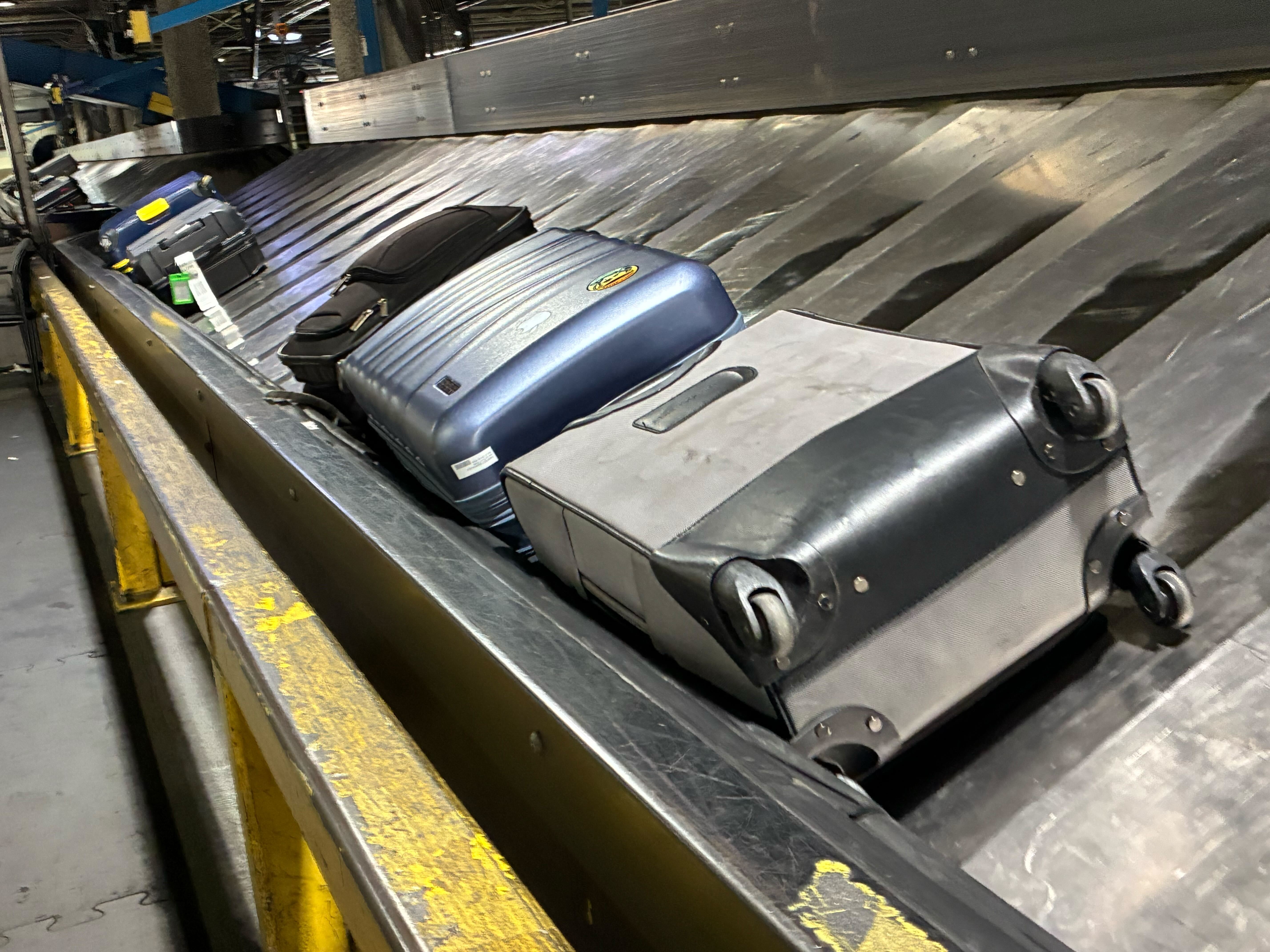 Baggage on internal airport conveyor belt
