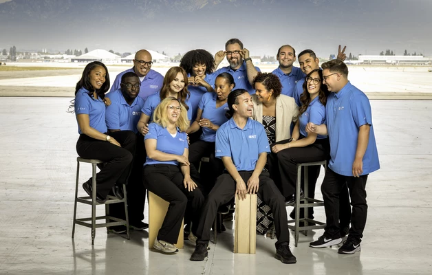 Customer Experience Team posing or a photo with smiling faced