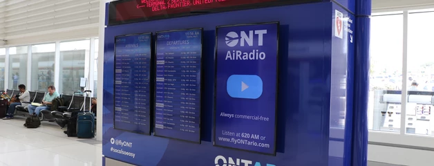 Screens inside the terminal promote ONT Radio.