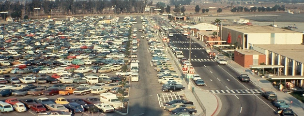 Hundreds of cars are seen parked in front of ONT's Terminal 1.