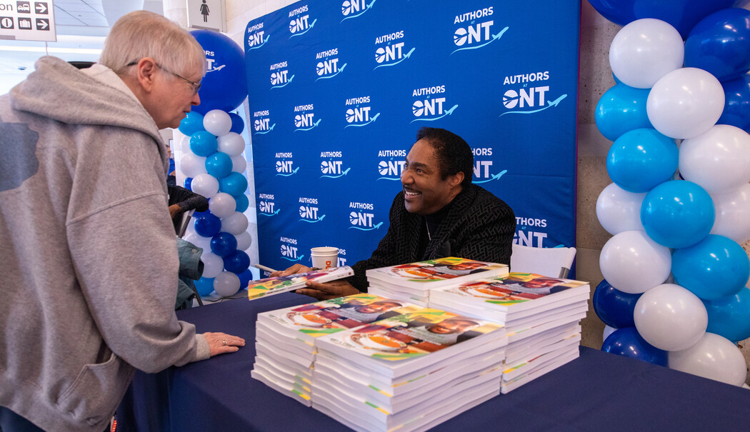 Author Terry Steele speaking with a passenger. 